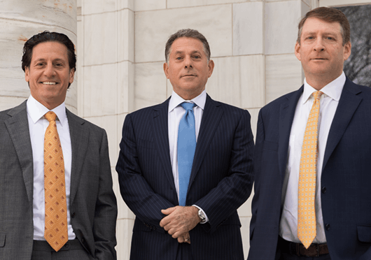 Attorneys standing outside of courthouse