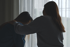 Loved one being comforted