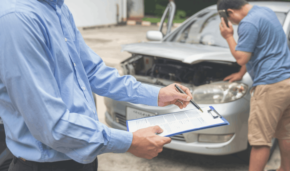 Person holding a clipboard after a collision
