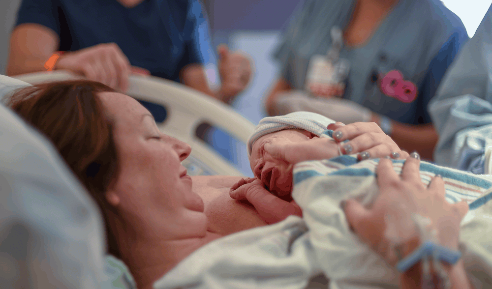 Mother holding newborn